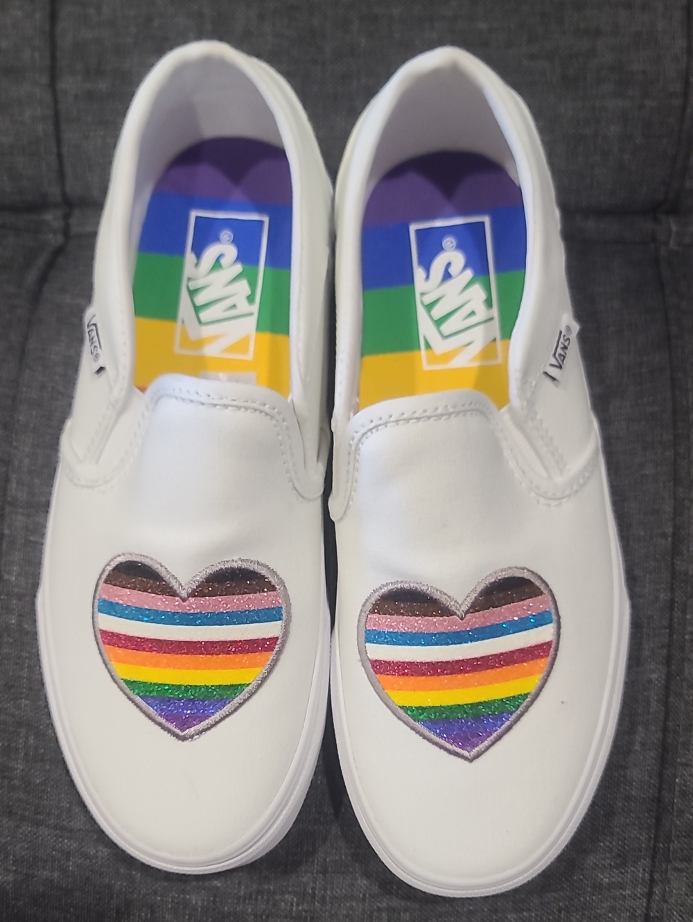 Vans White Slip-Ons with Glitter Rainbow Heart Patches